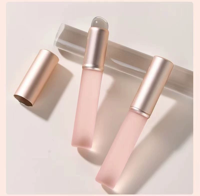 Lipstick, handheld concealer brush, lip care
