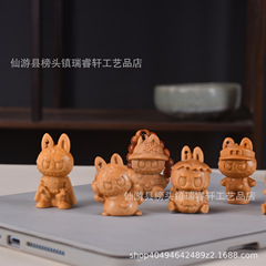 クスノキの木彫り工芸品、小さな装飾品、カボチャのラブブ漫画の文具、かわいい家の装飾の装飾品