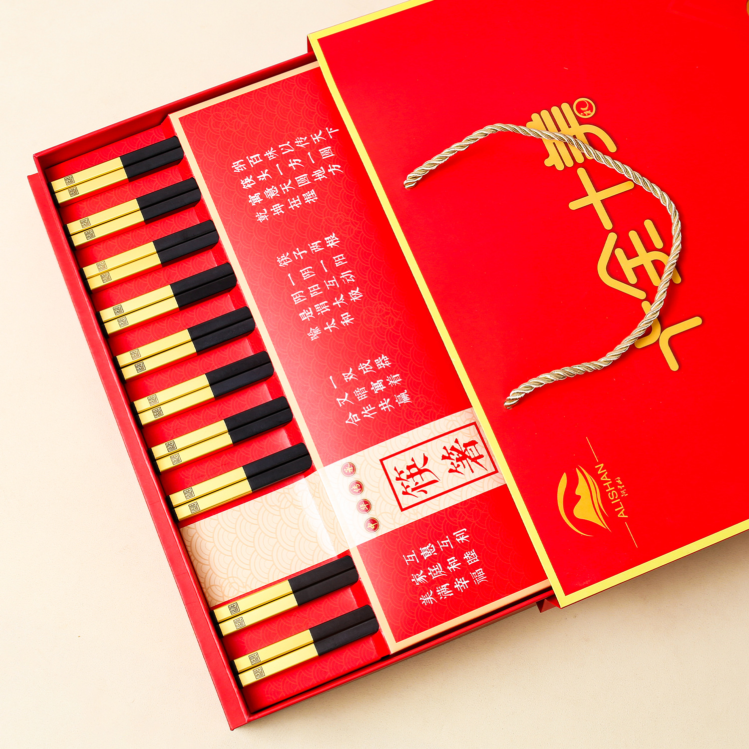 PPS palillos de aleación de regalo rojo estilo chino nacional moda festivo palillos regalo traje en stock letras al por mayor