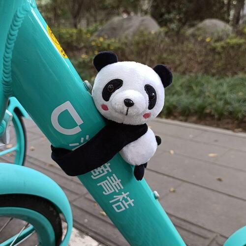 Bicycle panda lying on the electric car, motorcycle, motorcycle doll, small pendant, decorative slap circle, slap circle ornament