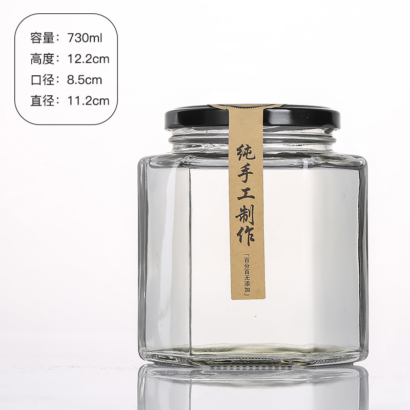 Hexagonal de vidrio enlatado sellado de grado alimenticio con tapa vacía un kilo de pasta de limón, miel, pimienta, botella de mermelada