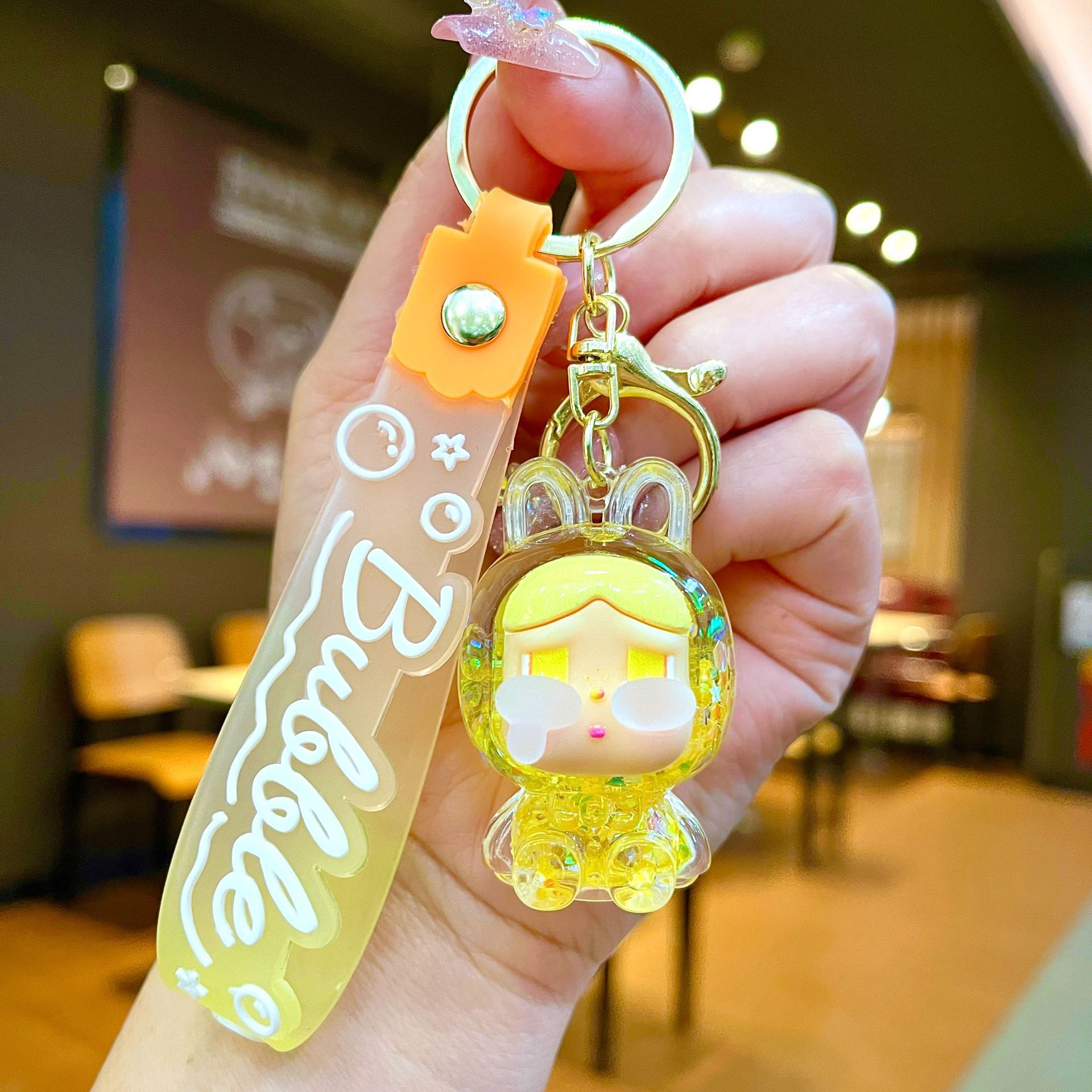 Llavero red acrílico con arena flotante