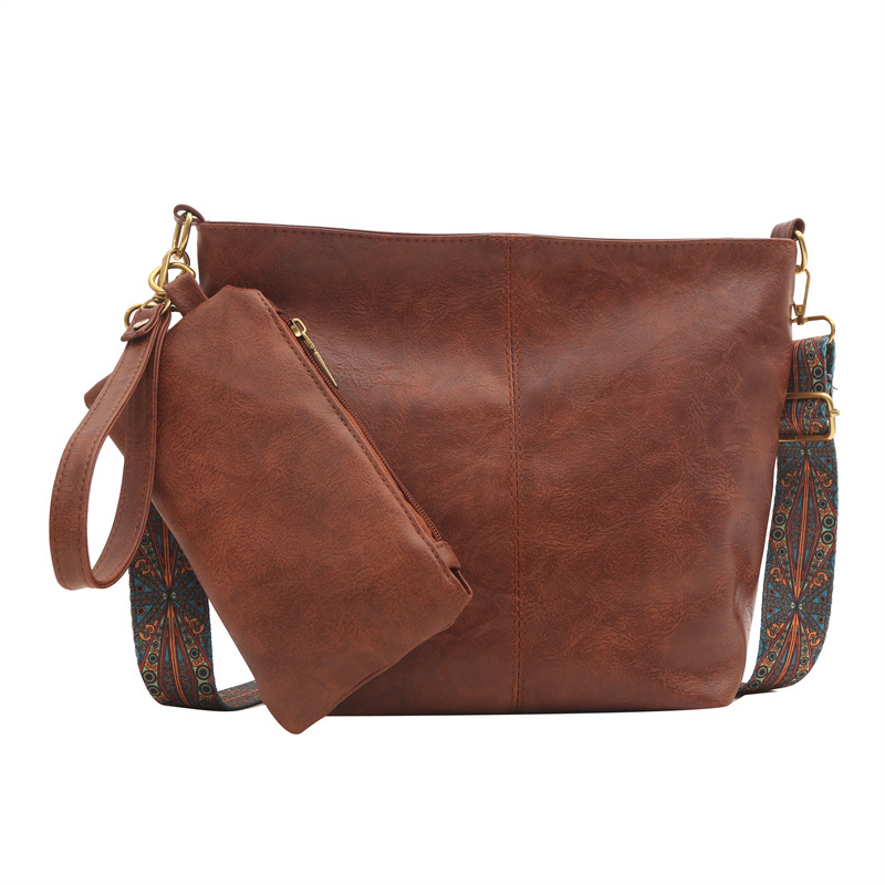 Nueva bolsa de hombro retro moda casual de gran capacidad bolsa de mano para mujeres 2024 moda de verano simple mochila