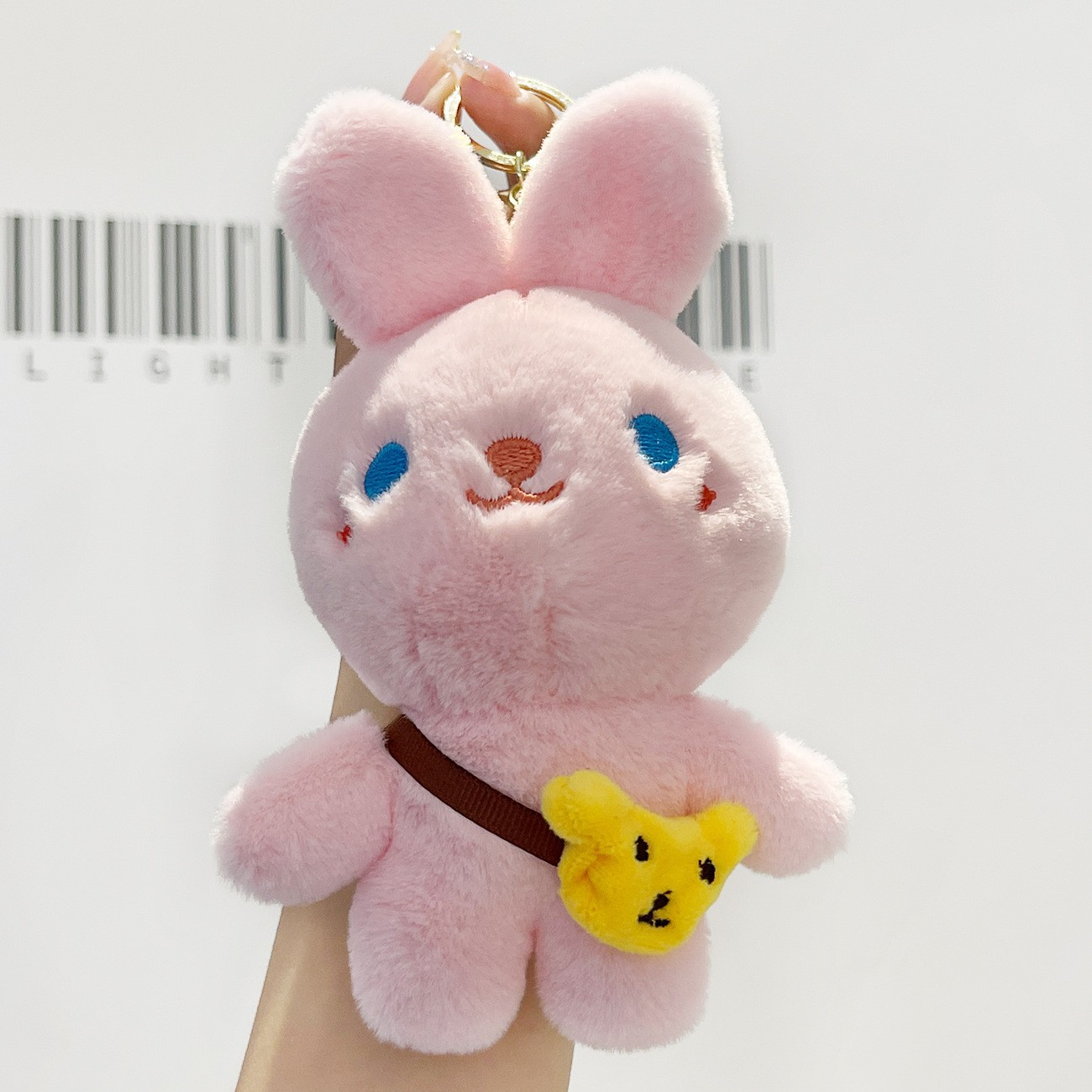 Cuatro pulgadas muñeca máquina colgante felpa llavero lindo muñeca mochila adornos grab máquina muñeca regalo al por mayor