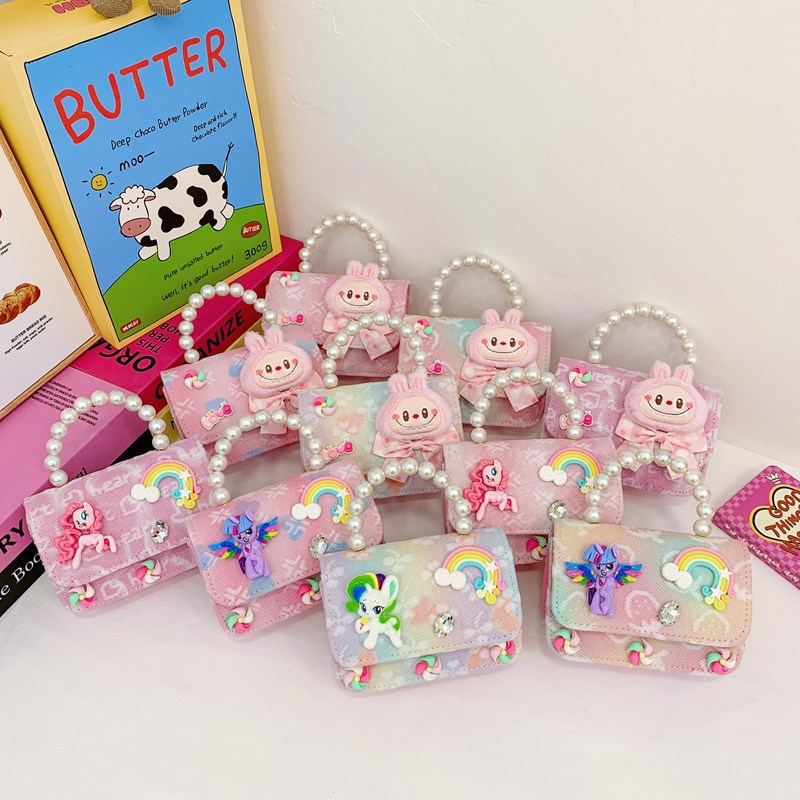 Bagos para niños 2025 nuevo estilo coreano de niña princesa bolso de cambio de mano lindo bolso de hombro de dibujos animados de peluche