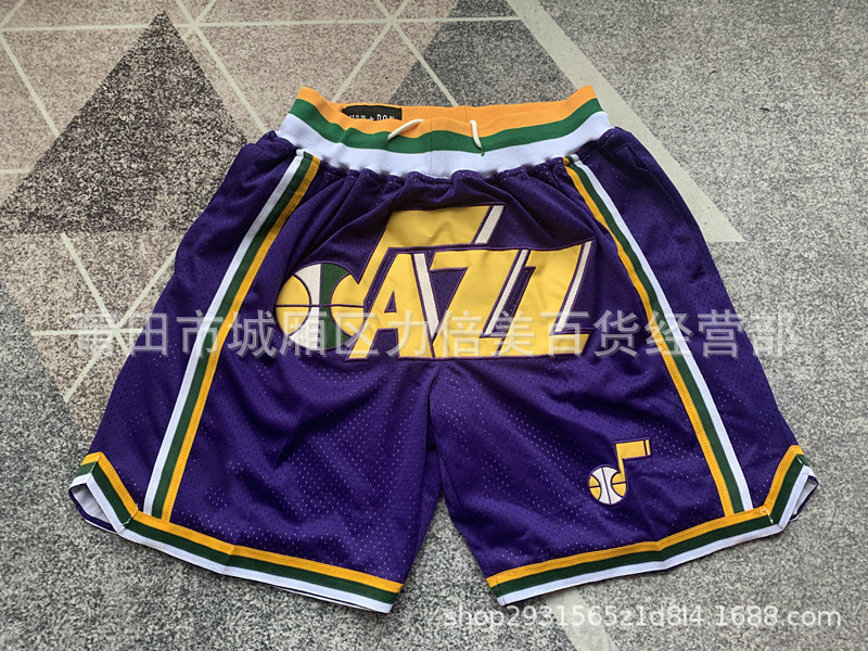 Comercio exterior pantalones de fútbol al por mayor Warriors Lakers 76 caliente Raptor mágico bolsillo bordado pantalones cortos pantalones de baloncesto NFL