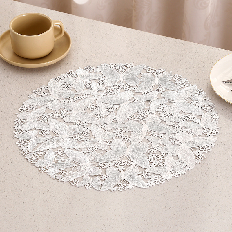 Diseño hueco de fábrica mariposa almohadilla impermeable a prueba de agua a prueba de aceite PVC almohadilla de taza de lujo ligera europea almohadilla de mesa INS almohadilla al por mayor