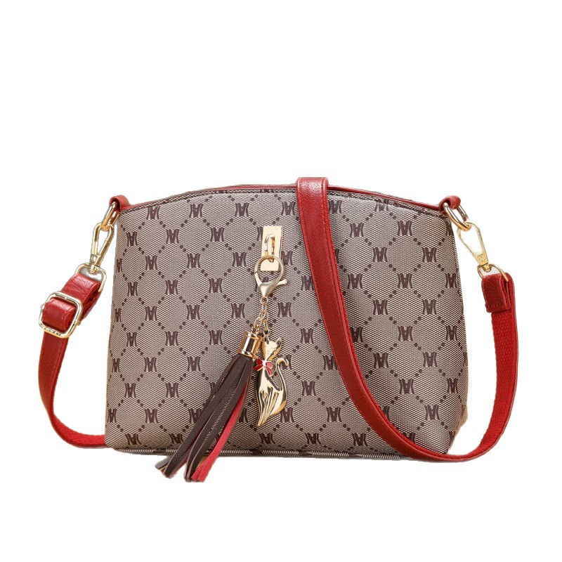 Bolsa de hombro de moda casual versátil casual diaria mochila de viaje hermoso colgante bolsas transfronterizas