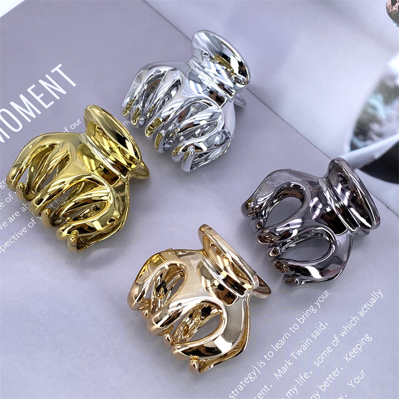 Galvanoplastia PC material continuo galvanoplastia uv4 color aumento de la altura horquilla tamaño pequeño agarre Clip 2 yuanes tienda física accesorios para el cabello accesorios de cabeza