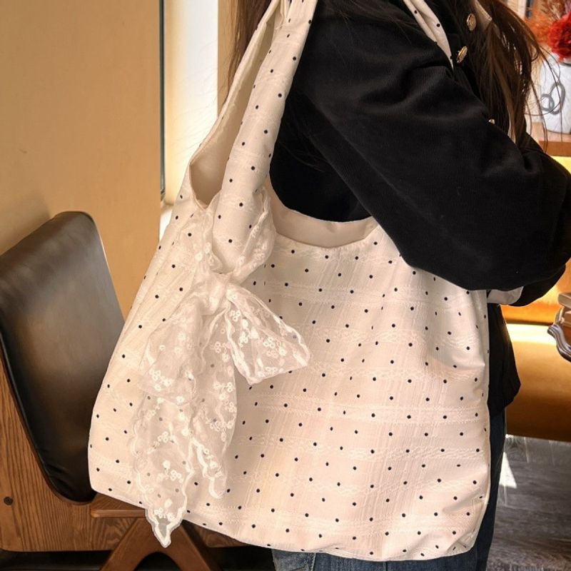 2025 large-capacity canvas tote bag, Korean-style, new design, suitable for students, commuting, and everyday use, with a polka dot pattern and versatile shoulder strap