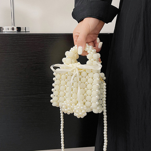Fairy bag summer new 2024 forest bow style handbag ins crossbody pearl woven bag trendy