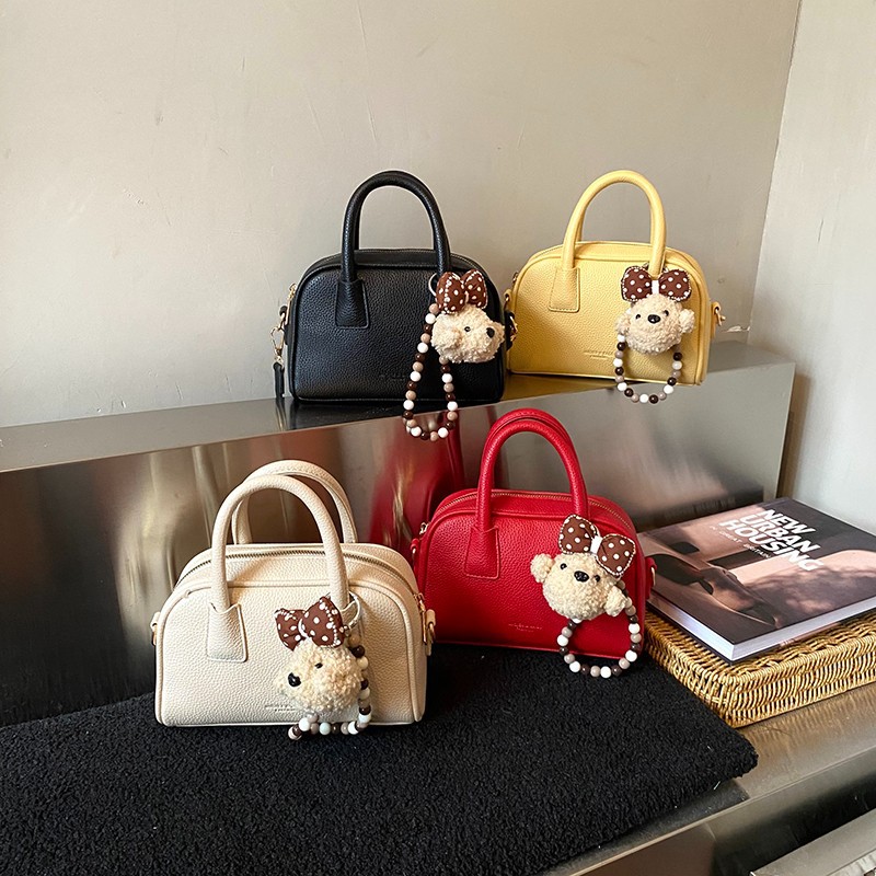 Niche Zhong bolso de almohada portátil para mujeres 2026 nuevo bolso de hombro bolso coreano bolso conchas de litchi