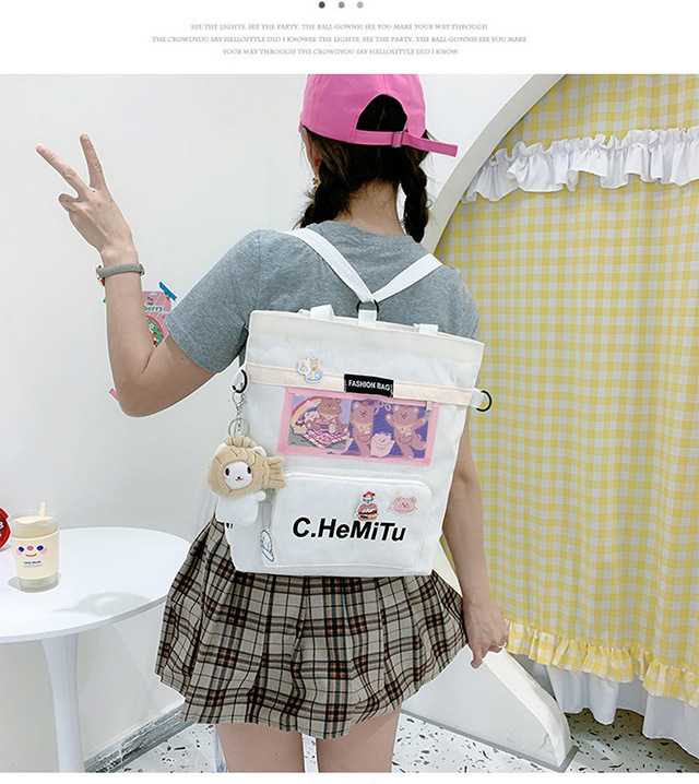 Korean-style canvas bag for girls with one shoulder, in the style of Harajuku, ulzzang, with a large capacity and contrasting colors, is a crossbody hand-held schoolbag for classes undefined
