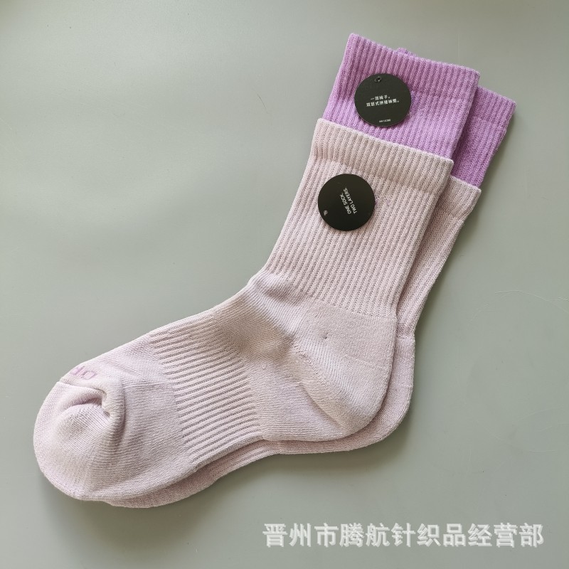 蘇万ナイキの靴下のカラーの二重は男女の中で長い筒のタオルの底のスポーツの靴下をつなぎ合わせてバスケットボールの靴下を走ります。