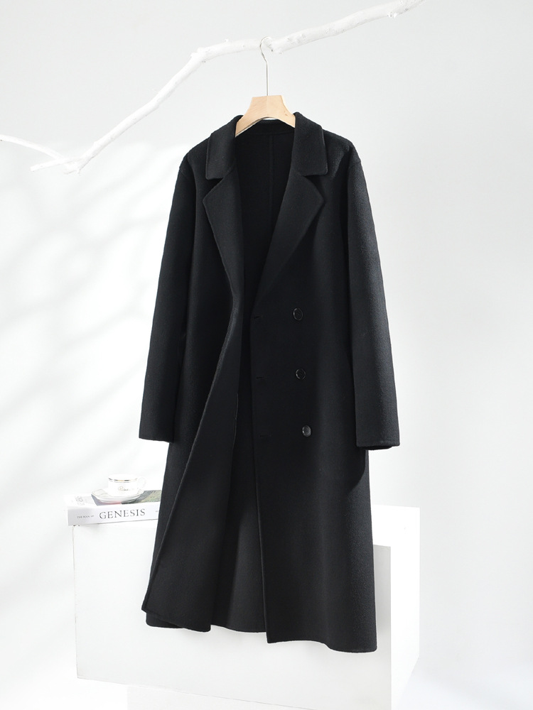 秋冬の長いタイプの膝の両面のカシミヤのコートの男性の双列は韓国版のスーツのゆったりしているウールのフードのコートを掛けます。