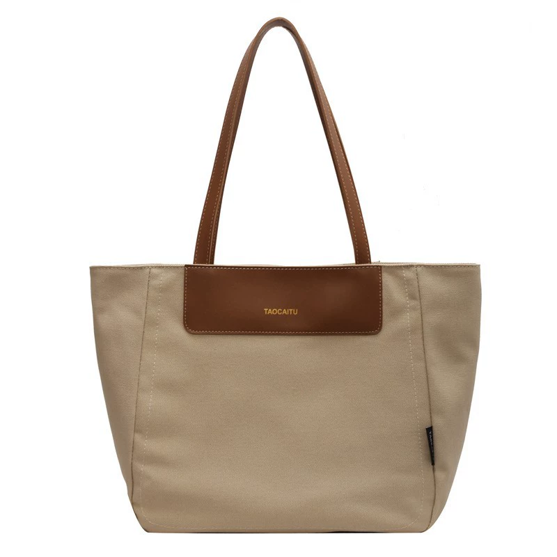Demi-season universal capacious shoulder bag