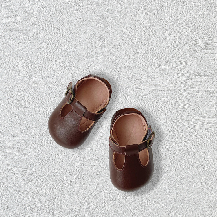 Factory direct supply new 0-2 years old Korean version of toddler shoes soft bottom soft anti-slip shoes solid color baby leather shoes 4