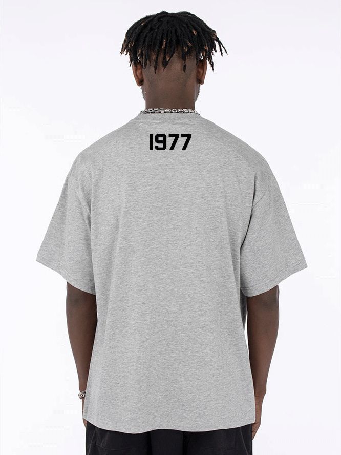 Heavy 350g de hilo doble manga corta para hombres y mujeres escote pequeño 1977 Camiseta de algodón suelta media manga blanca caída hombro media manga