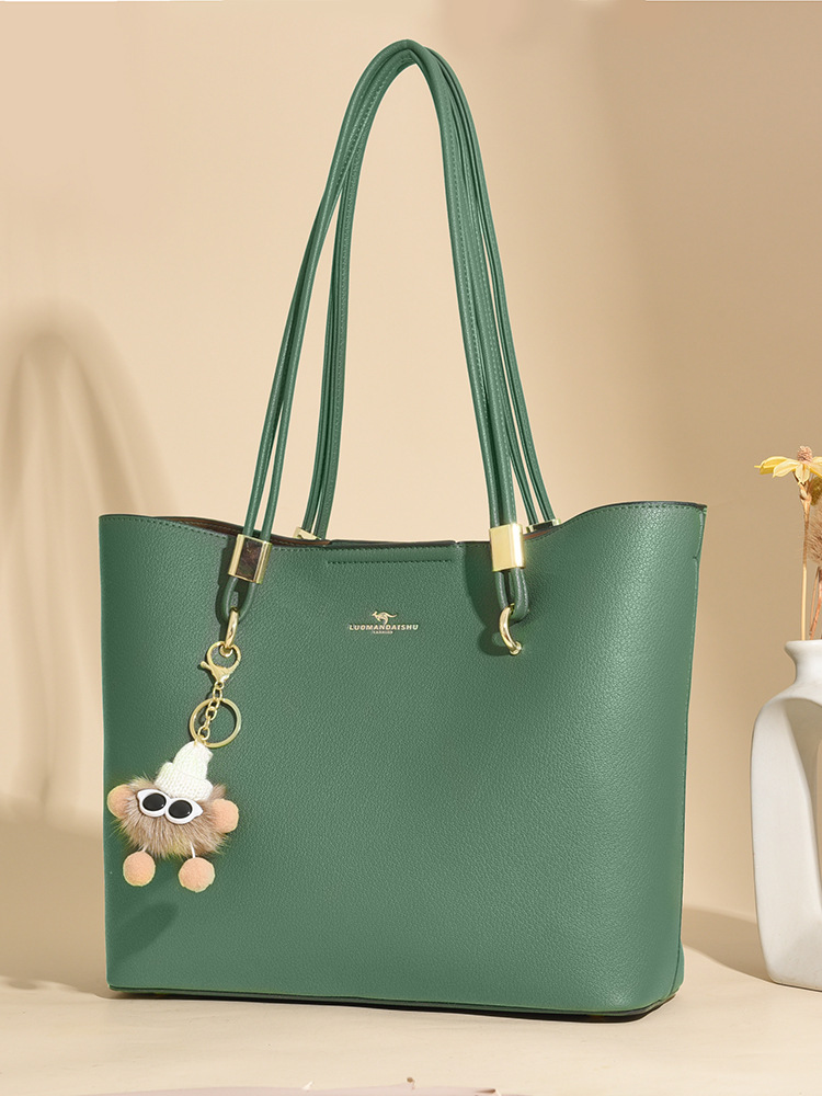 Nueva moda de mujer atmósfera bolso de mujer para enviar a la madre un paquete de hombro grande, envío gratuito.