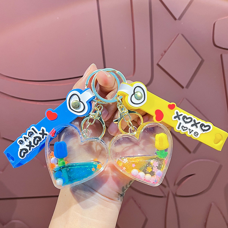 Petróleo amor tulipas llavero estereoscópico muñeca exquisita pareja colgante bolsa de automóvil garra máquina regalos al por mayor