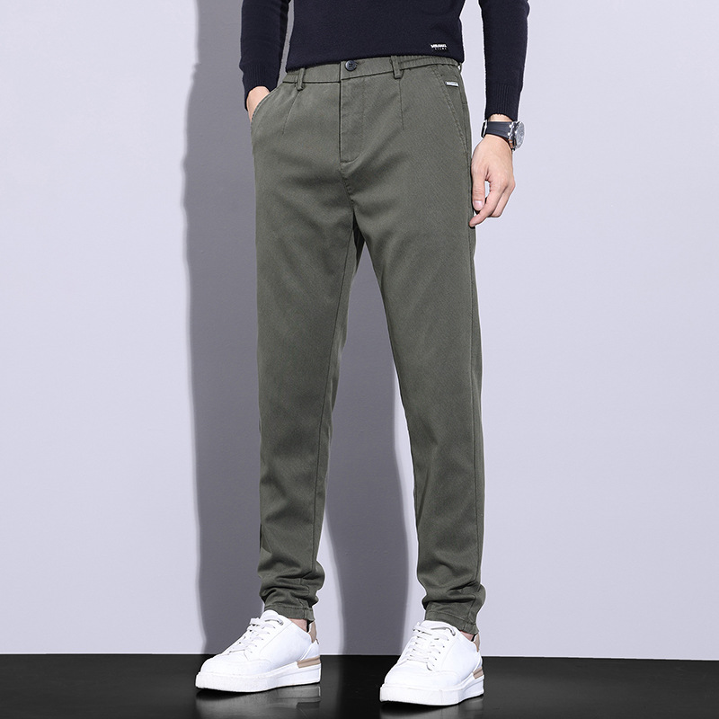 Pantalones juveniles populares para hombres casuales Otoño e Invierno nuevos pantalones antiarrugas resistentes al desgaste pantalones de todos los partidos juveniles elásticos pantalones casuales cómodos