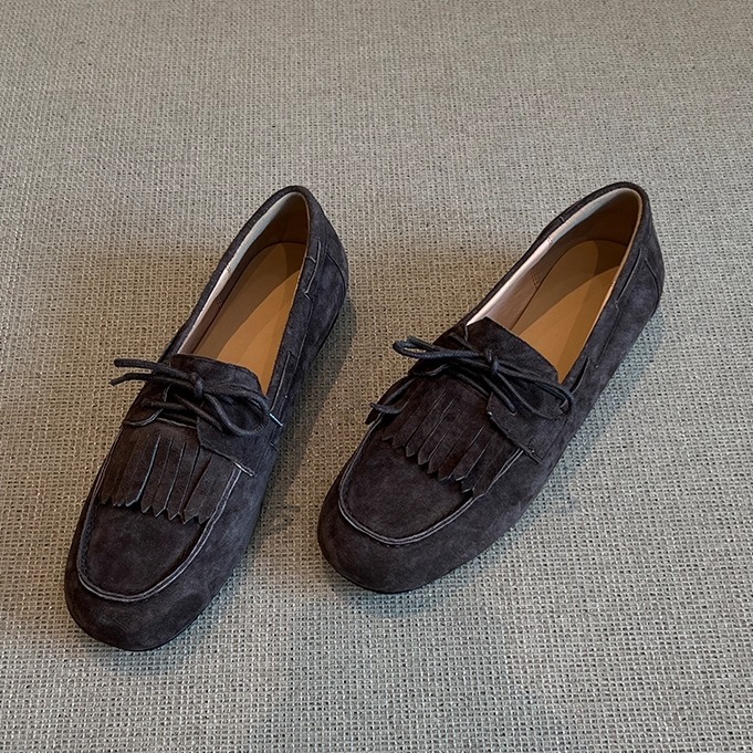 In dark brown leather