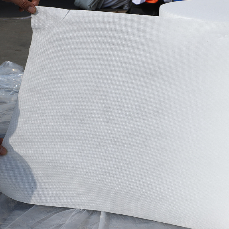 Blanco no tejido bolsa de mano rollo PP tela acrílico no tejido materia prima bobina espinada no tejida regenerada