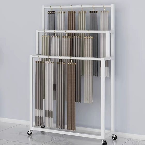 Tienda de ropa almacena tela de piso manta bufandas estante de exhibición pantalones multicapa estante de exhibición bufandas de seda contra la pared image 14