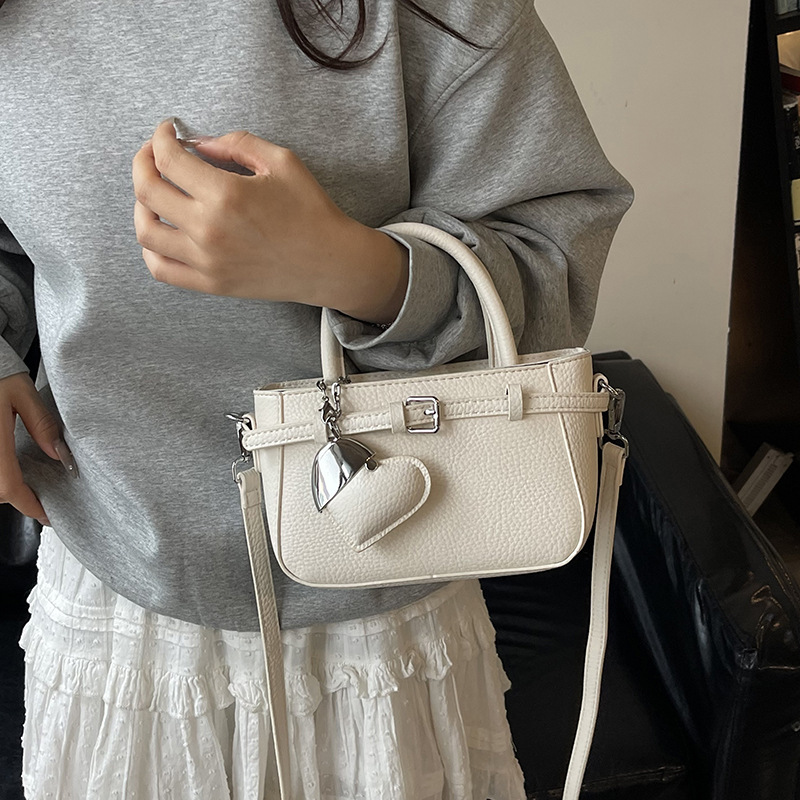 Bolso Tote de diseño de nicho 2025 verano nuevo estilo bolso de hombro con patrón de lichi bolso de mensajero de amor de moda mujer