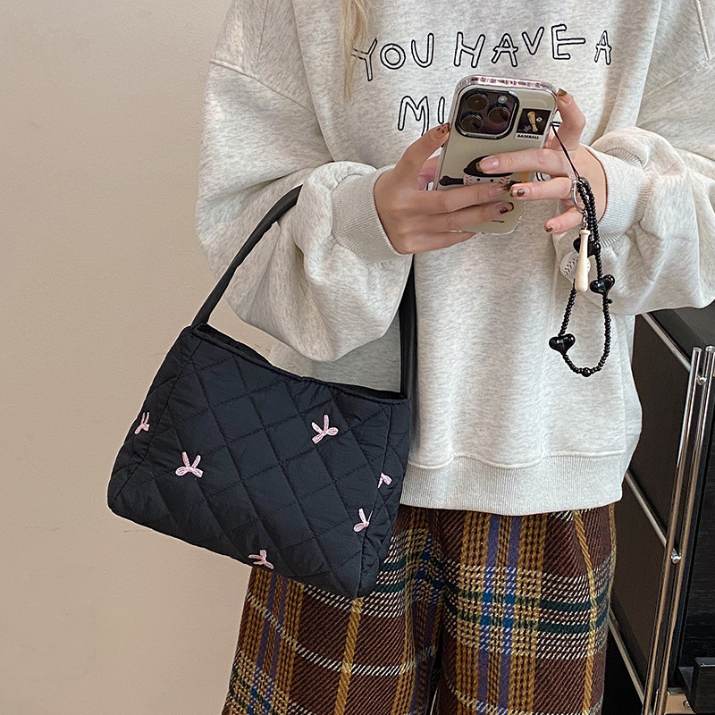 2024 nuevo bolso de arco de bordado, bolsa de maquillaje de gran capacidad, bolsa de lavado, bolsa de ocio, bolsa de mujer