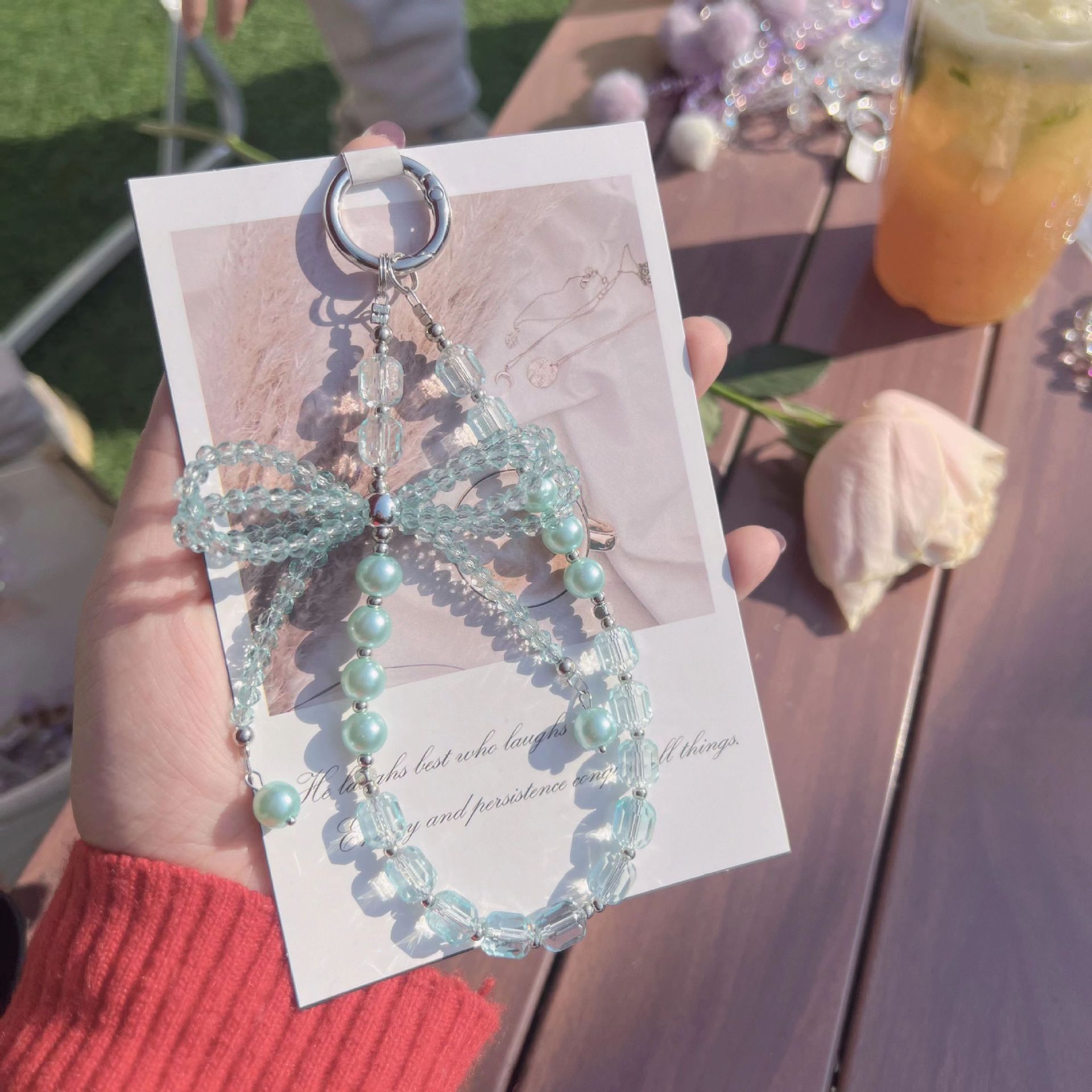 Lazo de perlas de lujo cadena de teléfono móvil cordón de teléfono móvil de alta gama cristal tridimensional corto exquisito cordón de muñeca ins