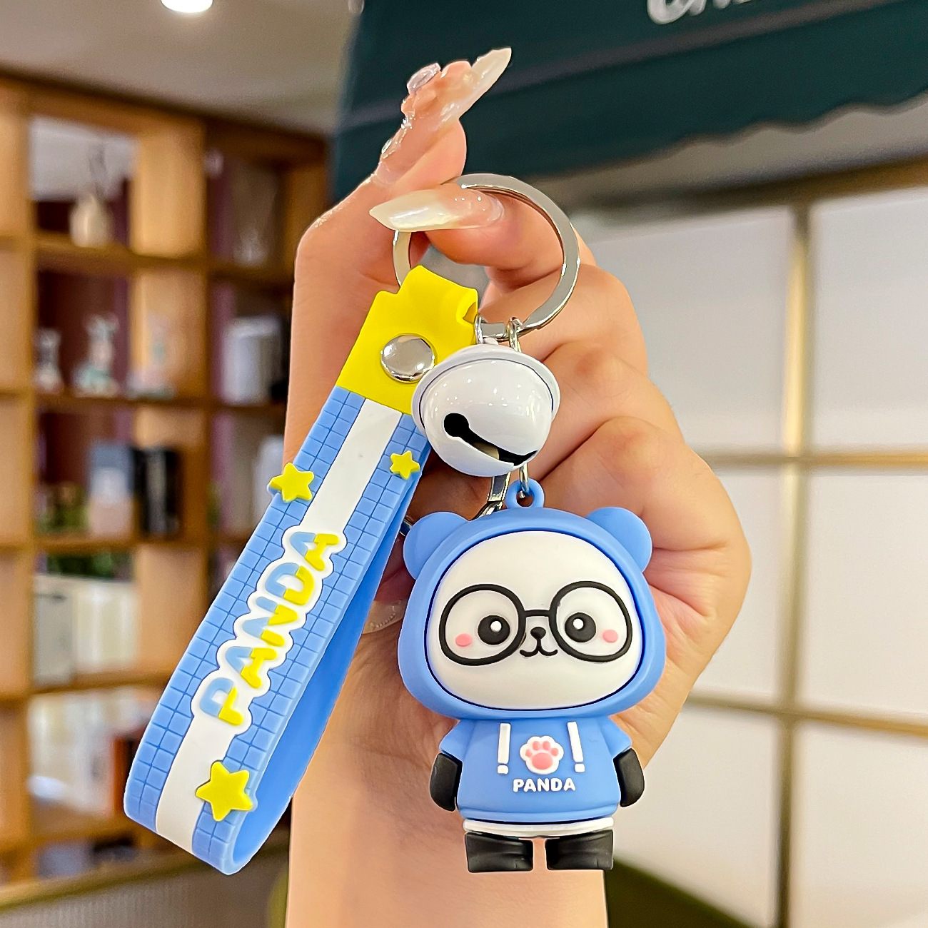 Muñeca de goma goteando bolsas escolares colgantes colgantes de muñecas colgantes de la máquina del mercado nocturno regalos al por mayor llaveros de dibujos animados