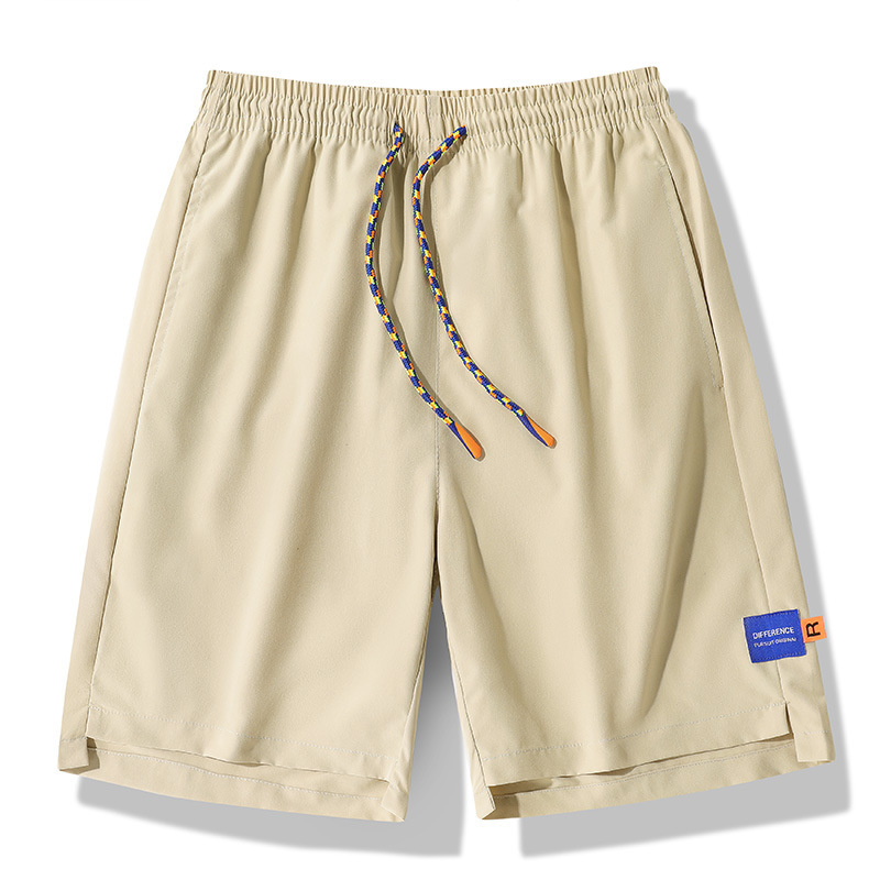 Pantalones de verano para hombres, pantalones cortos casuales de moda para hombres, pantalones de playa sueltos, fábrica directa.