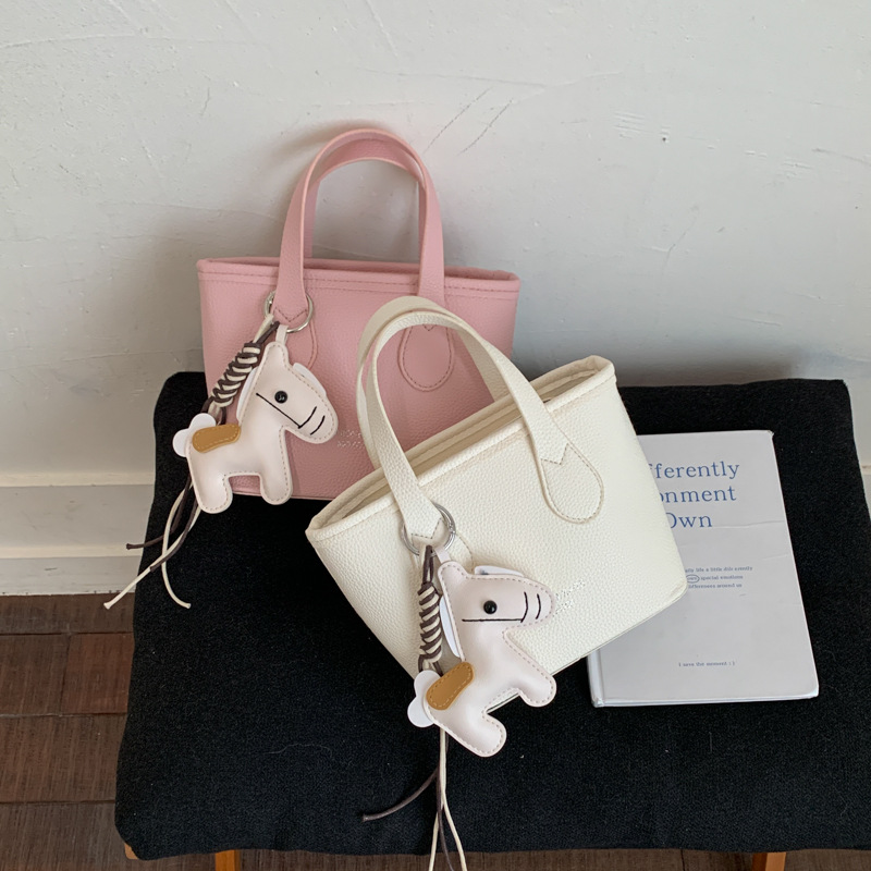 Semplice ed elegante borsetta piccola da donna, nuova collezione estate 2026, borsa a secchiello da donna alla moda e versatile con texture._voghion.com