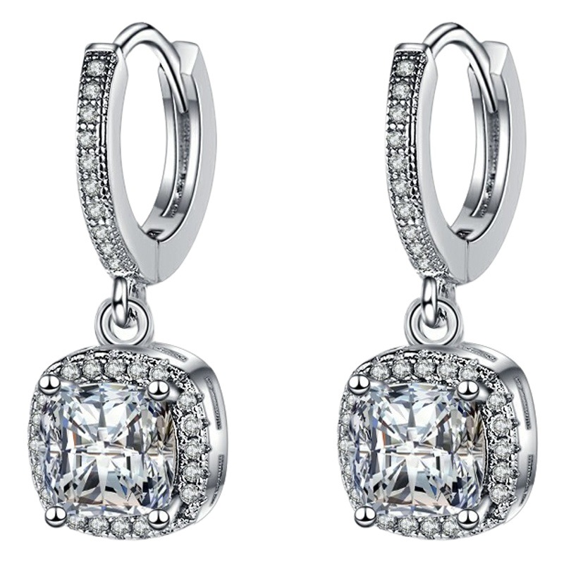 Amazon deseo venta caliente platino blanco cuatro-garra oreja hebilla femenina temperamento europeo y americano estilo joyería de una sola pieza entrega pendientes