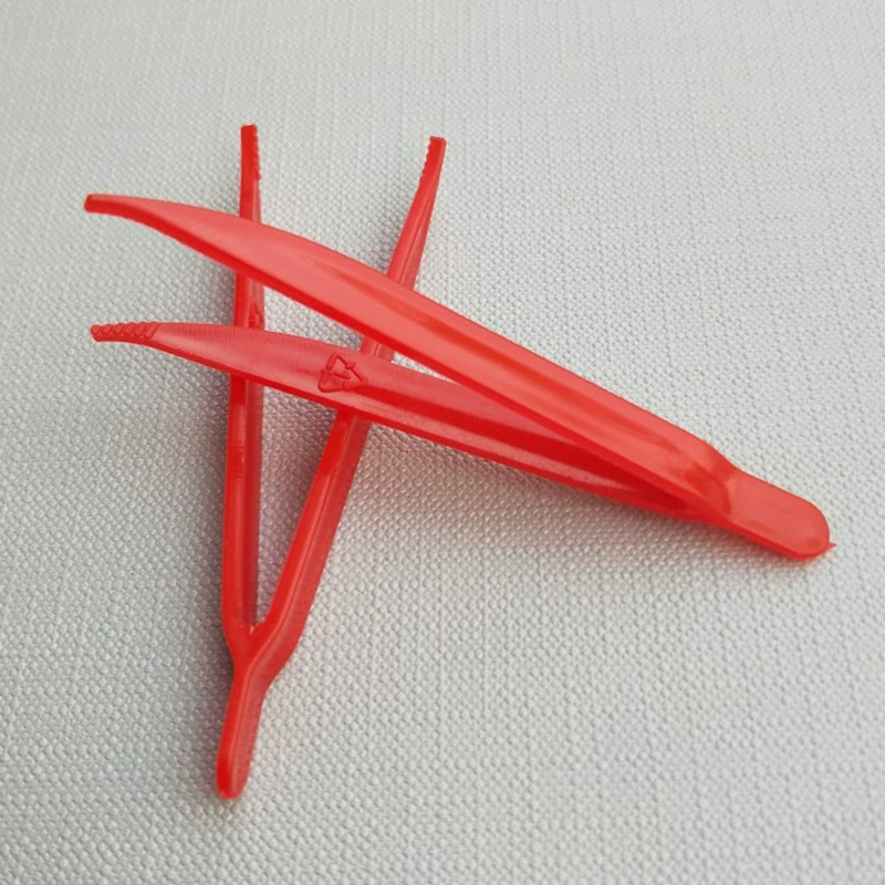 Plastic white tweezers, children's toy