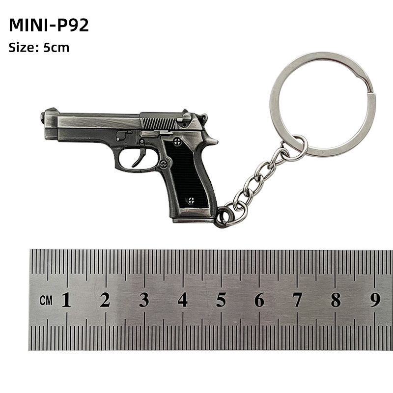 Mini colgante de pollo P90 S686 llavero de aleación de DP-28 metal modelo de pistola de juguete trinket