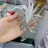 Hair accessory suitable for photo sessions for bride with tassels