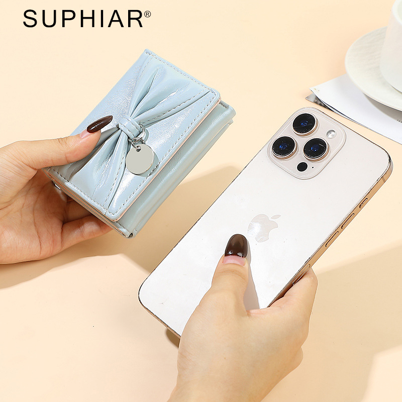 Sudeste asiático simple pu piel arco billetera cartera en una billetera de cambio transfronteriza billetera de dama estudiantes lindos