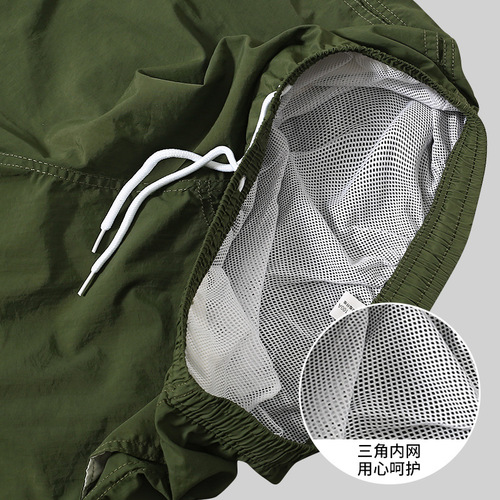 Men's European and American Beach Shorts 2024 Spring and Summer Quick-Drying Loose Beach Vacation Shorts Four-Way Pants Solid Color Sports Pants