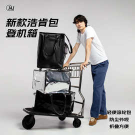跨境浩肯包新款万向轮旅行包便携行李袋带滑轮收纳包大容量健身包