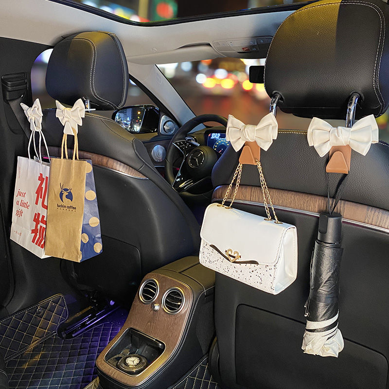 Garganto de automóvil Garganto de respaldo de silla Red cuero lindo arco multifuncional coche pequeño gancho de plástico