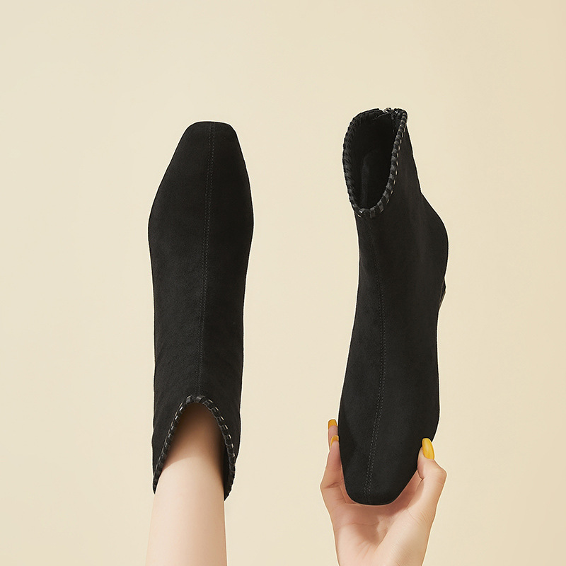 Otoño de 2026 nuevo temperamento botas de talón grueso zapatos de mujer delgados botas de talón alto botas de moda universal