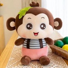 ぬいぐるみのサルのぬいぐるみが国境を越えたアニメの子供たちが枕をなだめてかわいい人形をつかむ人形卸売り