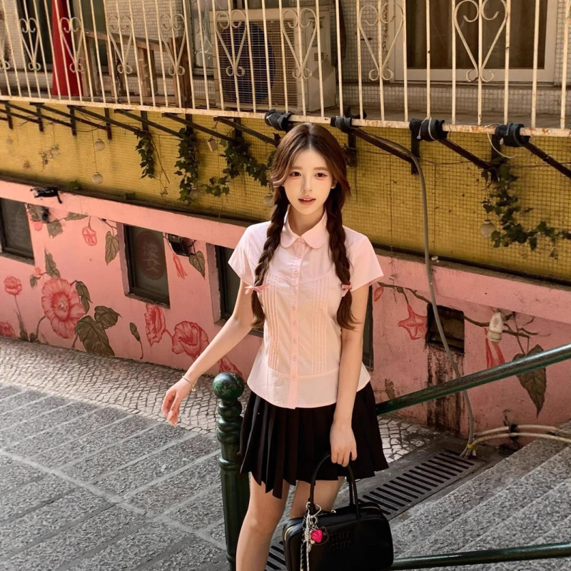 韓国の甘いピンクの女性用半袖シャツ 2025 年夏の新しいルーズカジュアルウエスト多用途の小さなフライングスリーブトップ|undefined