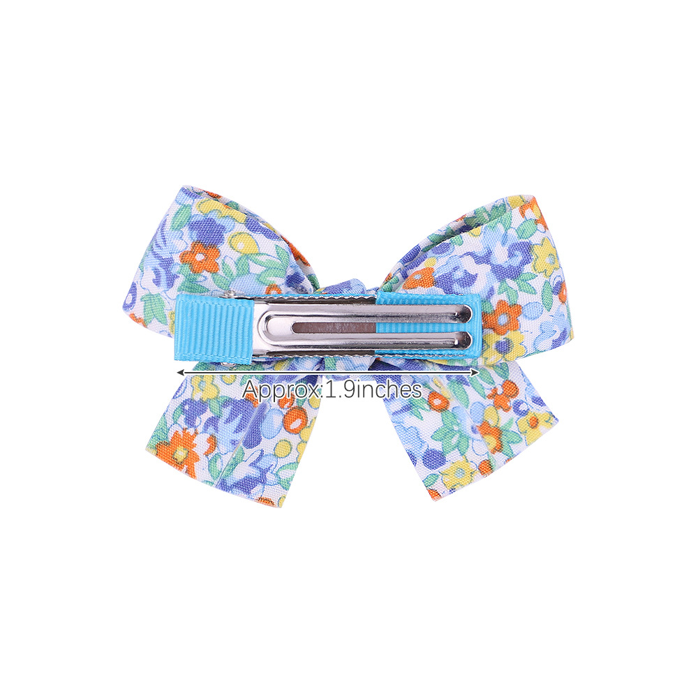 Fashion New Bow Hairpin Floral Fabric Cute Baby Solid Color Hair Accessories display picture 2
