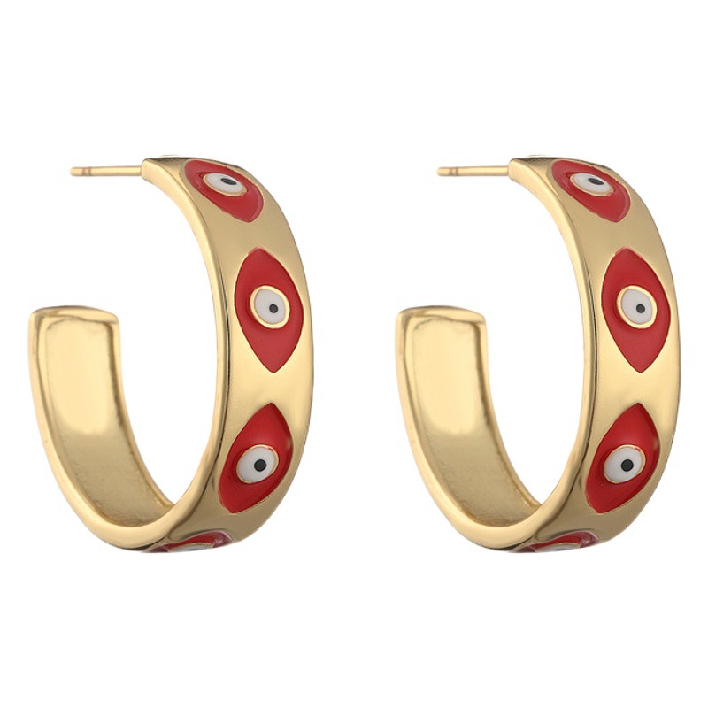 Venta caliente europea y americana transfronteriza cobre plateado oro goteo aceite de goteo del ojo del diablo pendientes esmalte diseño joysticks