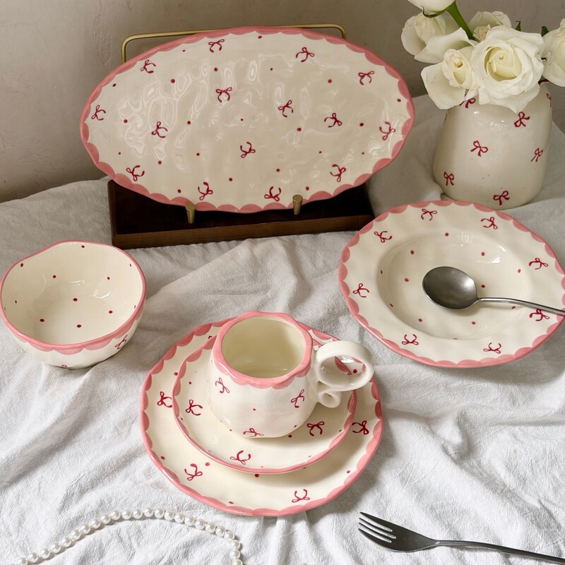 Hand-painted irregular ceramic plate and bowl set with bows, high aesthetic coffee cup and saucer, girly style tableware Hand-painted irregular ceramic plate and bowl set with bows, high aesthetic coffee cup and saucer, girly style tableware