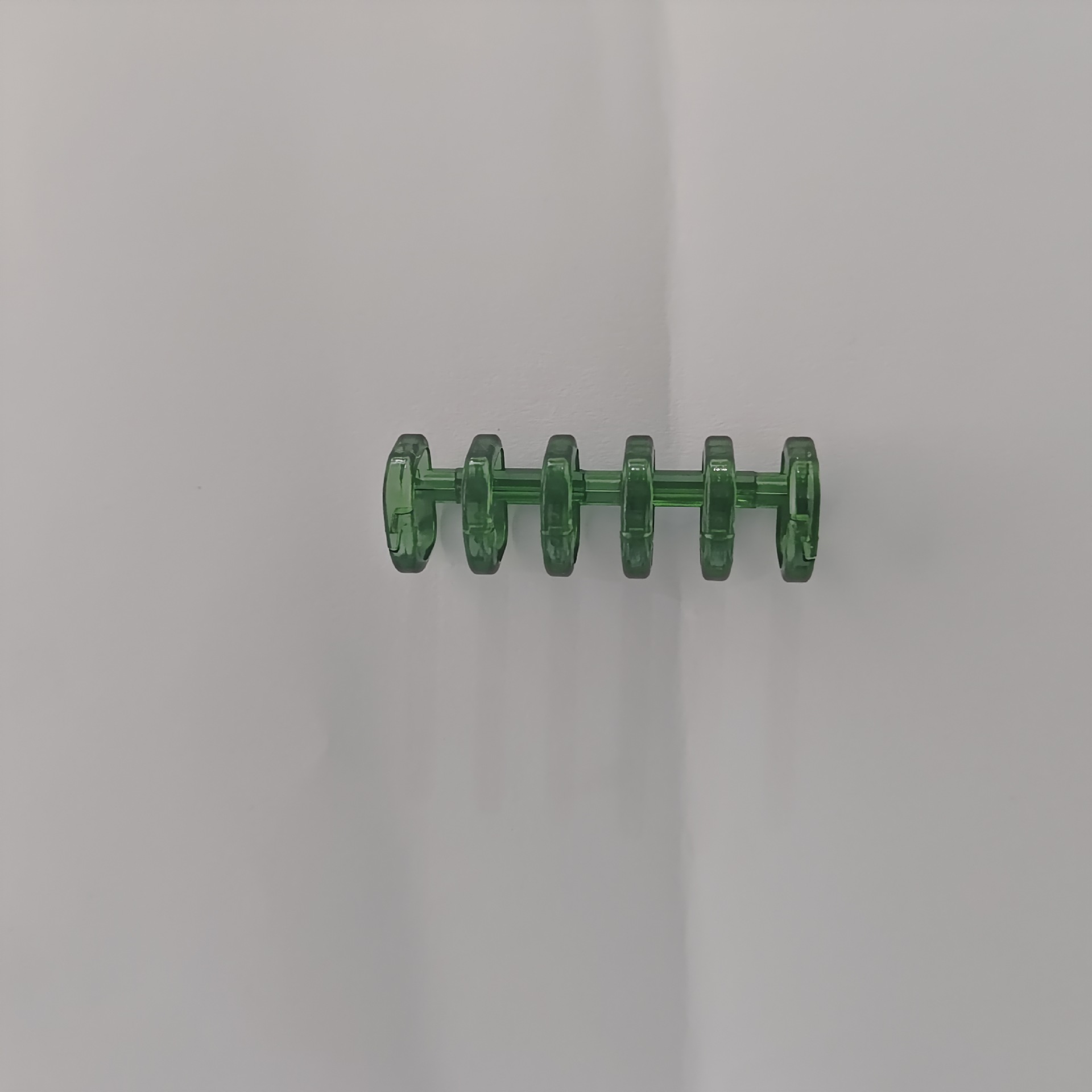 Anillo verde oscuro de 6 agujeros