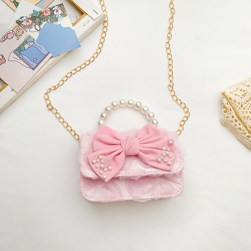 Dulce princesa bolso de hombro de perlas portátiles 2025 mini bolso de cadena de arco para niños